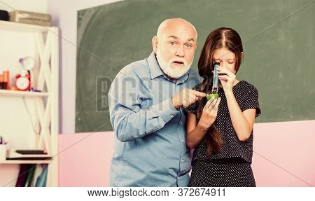 Science Lab. Small Girl Explore Fruit Slice. School. Microscopy. Analysis And Synthesis. Expand Know