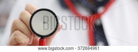 Doctor In White Coat Shows Stethoscope Membrane. Poor Environmental Conditions And Stress Affect Hea