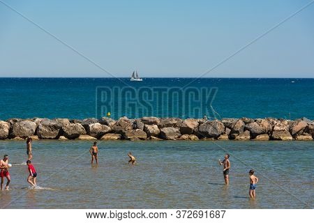 Canet En Roussillon, France: June 21, 2020: Sunny Day In The Tourist Town Of Canet En Roussillion In