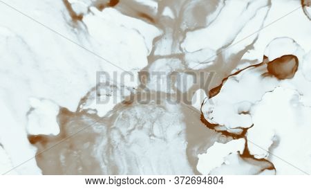 Magic Alcohol Ink Art.  Abstract Ink Art. Cocoa Color Marble Style Texture. Creamy Brown Shimmering 