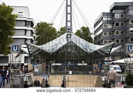 German People And Foreign Travelers Walking Up Down In Reinoldikirche Subway Train Station Go To Ost
