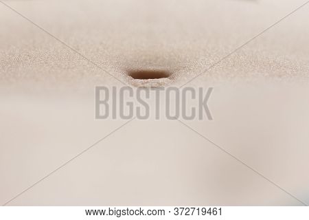 Close-up Detail Of Navel Of Girl. Human Body Skin Lit By Sunlight