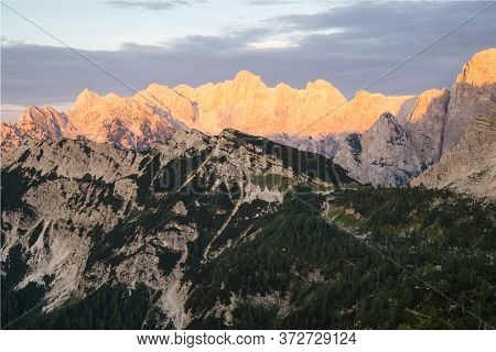 Amazing Sunrise In The Mountains. Purpel Orange Mountains Of Julian Alps, Triglav National Park, Slo