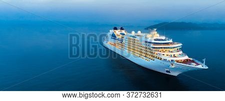 Aerial View Of Beautiful White Cruise Ship Above Luxury Cruise In The Ocean Sea At Early In The Morn