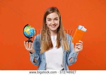 Smiling Young Woman Girl In Casual Denim Clothes Posing Isolated On Orange Background In Studio. Peo