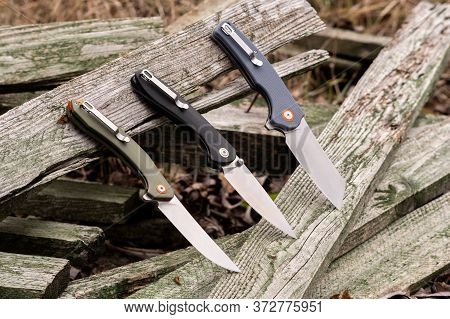 Comparison Of Several Knives. Several Knives In A Row. Showcase Of Knives.