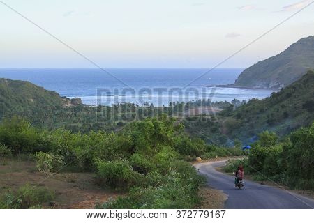 Scooter On Road To Mawun Beach, Lombok, Indonesia. Kuta Lombok Is An Exotic Paradise On The Indonesi