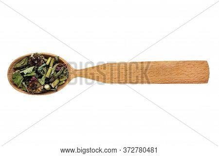Dried Echinacea Purpurea In A Wooden Spoon On A White Background. Phytotherapy And Disease Preventio