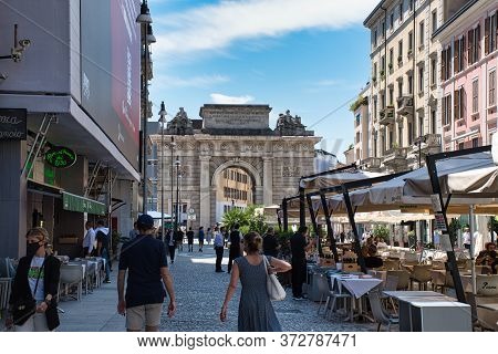 Milan, Italy 06.20.2020: People Walking And Having Lunch On Corso Como Complying With The Social Dis