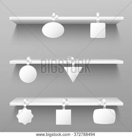Wobblers On Wooden Shelves. Blank Price Tags Hang On Rack On Grey Wall Background. Paper Stickers On