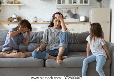Hyperactive Kids Tired And Complain Near Upset Mother.