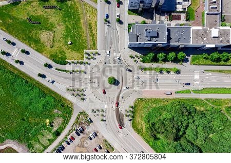Aerial View Of A Traffic Roundabout In The Residential District Of Espoo, Finland.