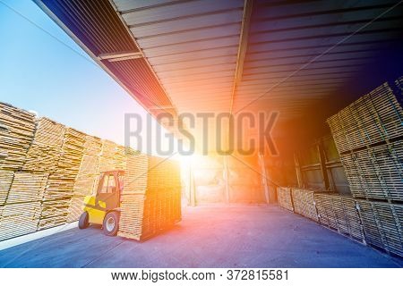 Forklift Loader Load Lumber Into A Dry Kiln. Wood Drying In Containers.