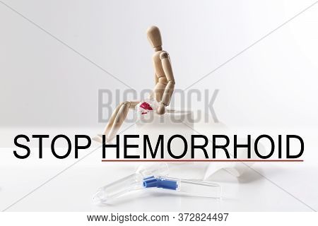 Composition With Anoscope On White Background. Stop Hemorrhoid
