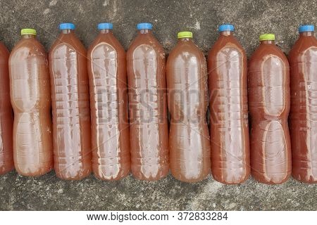 Effective Microorganisms Water (em) That Agriculturist Make From Organic Fertilizers In Plastic Bott