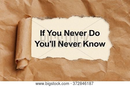 Text If You Never Do You'll Never Know Appearing Behind Torn Brown Paper