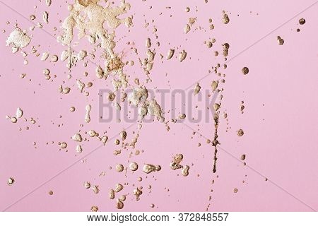 Pastel Pink Cardboard With Gold Potal Drops And Splashes. Creative Background