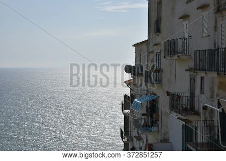 Beautiful Old Houses With Balconies  In Sperlonga Village. The Sea On Background. Sperlonga, Lazio, 