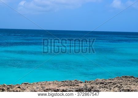 Arikok Natural Park On The Island Of Aruba In The Caribbean Sea With Deserts And Ocean Waves On The