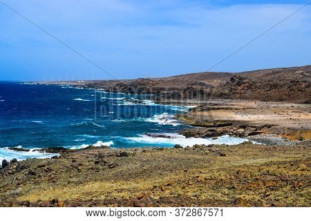 Arikok Natural Park On The Island Of Aruba In The Caribbean Sea With Deserts And Ocean Waves On The