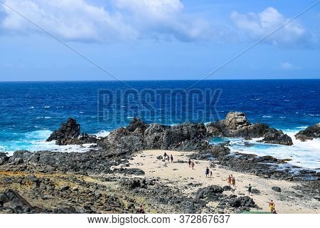 Arikok Natural Park On The Island Of Aruba In The Caribbean Sea With Deserts And Ocean Waves On The