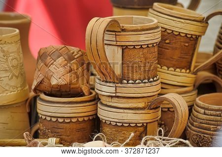 Mugs With A Lid Made Of Birch Bark In The Shop