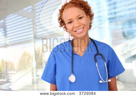 Pretty African Nurse At Hospital