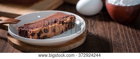 Chocolate Flavor Taiwanese Traditional Sponge Cake (taiwanese Castella Kasutera) On A Wooden Tray Ba