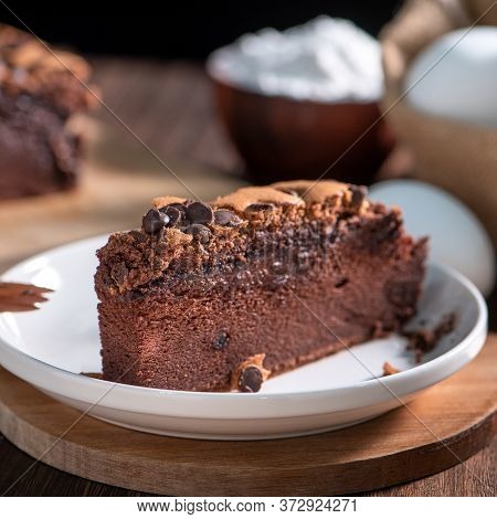 Chocolate Flavor Taiwanese Traditional Sponge Cake (taiwanese Castella Kasutera) On A Wooden Tray Ba