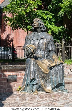 Olsztyn, Poland - May 31, 2020: Monument Famous Astronomer Nicolaus Copernicus In Old Town Of Olszty