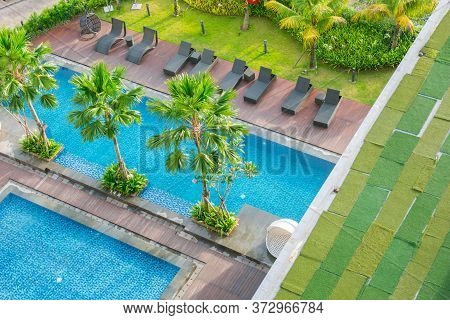 Swimming Pool Out Door With Green Grass Field