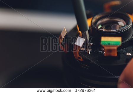 Precision Prime Optical Dslr Lens Service, Adjustment And Alignment. Camera Lens Repair Set In Photo