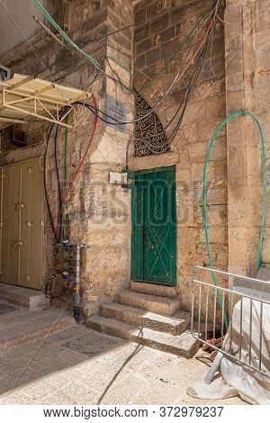 Jerusalem, Israel, June 13, 2020 : Old Buildings On Shaar Shalshelet Street In The Arab Quarter In T