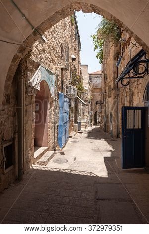 Jerusalem, Israel, June 13, 2020 : Old Buildings On Suq El Qatanin Street In The Arab Quarter In The