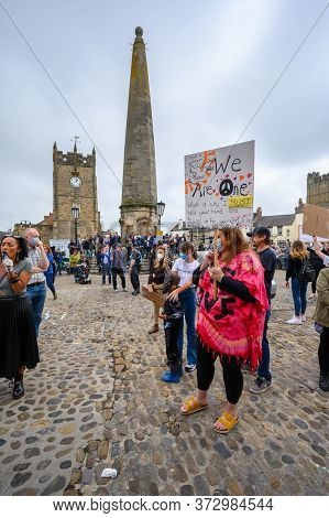 Richmond, North Yorkshire, Uk - June 14, 2020: Blm Protesters On The Cobbles In The Marketplace At A