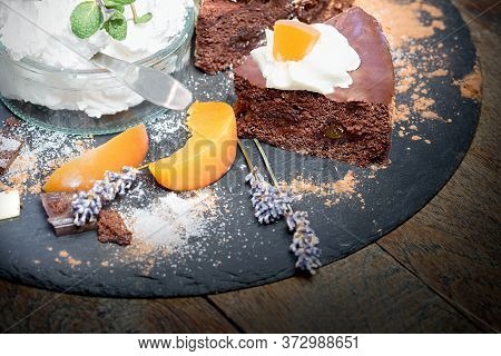 Creamy Chocolate Cake With Apricot, Apricot Jam - Marmalade And Whipped Cream In Glass Bowl