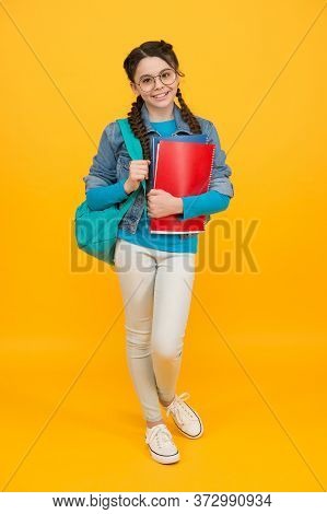 Make School Time Better. Little Child Hold Bag And Books. Happy Kid Back To School. September 1. Kno
