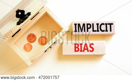 Implicit Bias Symbol. Concept Words Implicit Bias On Wooden Block. Beautiful White Table White Backg