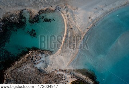 Aerial Drone View Of The Coastline Of Empty Beach In Winter. Summer Holidays. Nissi Beach Bay Ayia N