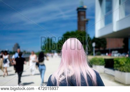 Tourists Walking On The Rhine Promenade In Cologne Deutz On A Sunny Summer Day