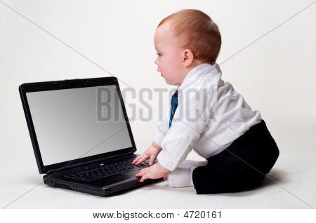 Negócio de bebê com Laptop em branco