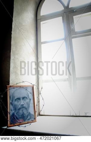 June 22, 2020-biysk, Russia. A Photo Of A Victim Of Stalin\'s Repressions Stands On The Windowsill O