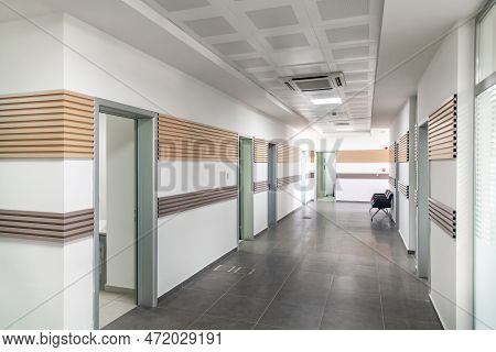 Empty Modern Office Corridor With Diminished Perspective And No People