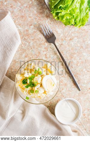 Potato Salad With Boiled Egg, Green Onion And Mayonnaise In A Bowl. Top And Vertical View