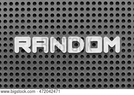 White Alphabet Letter In Word Random On Black Pegboard Background