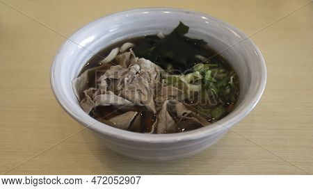 A Bowl Of Niku Udon, Soup Noodles With Sliced Beef.