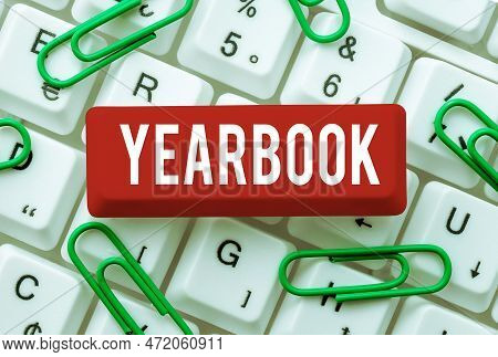 Sign Displaying Yearbook. Word For Publication Compiled By Graduating Class As A Record Of The Years