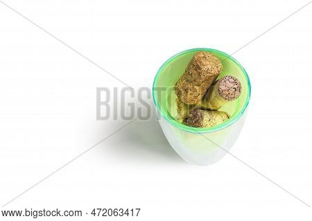 Wine Corks In Glass Isolated On White Background Close-up With Corks From Red Wine Bottles And With 
