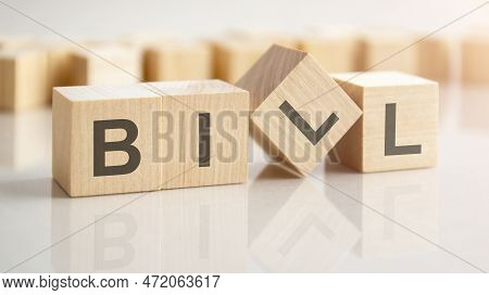 Text Biil On Wooden Blocks, Background Have Blur Effect
