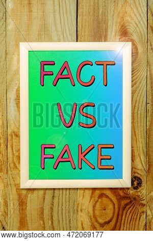 Sign Displaying Fact Vs Fake. Conceptual Photo Is It True Or Is False Doubt If Something Is Real Aut